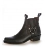 Black leather cowboy ankle boots with bridles