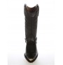 Custom-made black leather Mexican cowboy boots with buffalo bridles