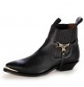 Black harness ankle boots metal tip
