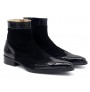 Trendy patent leather and black suede ankle boots