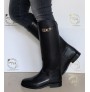 Black leather riding style boots with straps